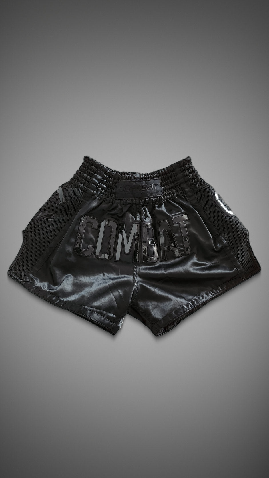 Combat Muay Thai Shorts in black, alternate front view